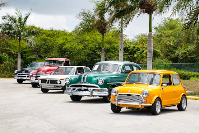 car2 antique cars lines up outside